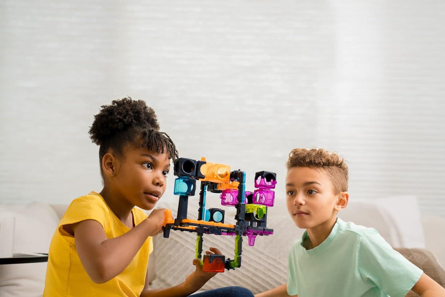 imageThinkFun Freefall LogicBased Marble Maze Game Skill Enhancing Fun for Kids Teens Adults MindStimulating Puzzles Single or Multiplayer